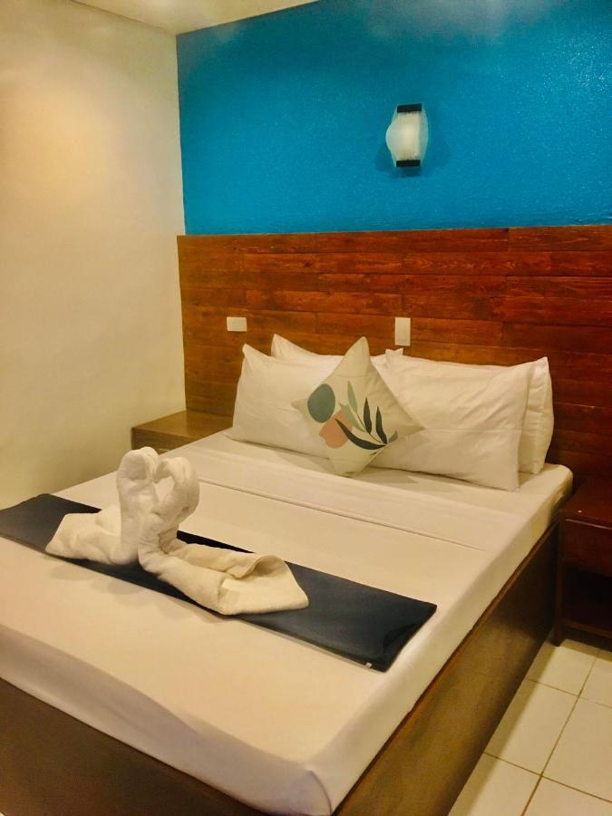 A&A Abe Bayfront Inn โกรอน ภายนอก รูปภาพ