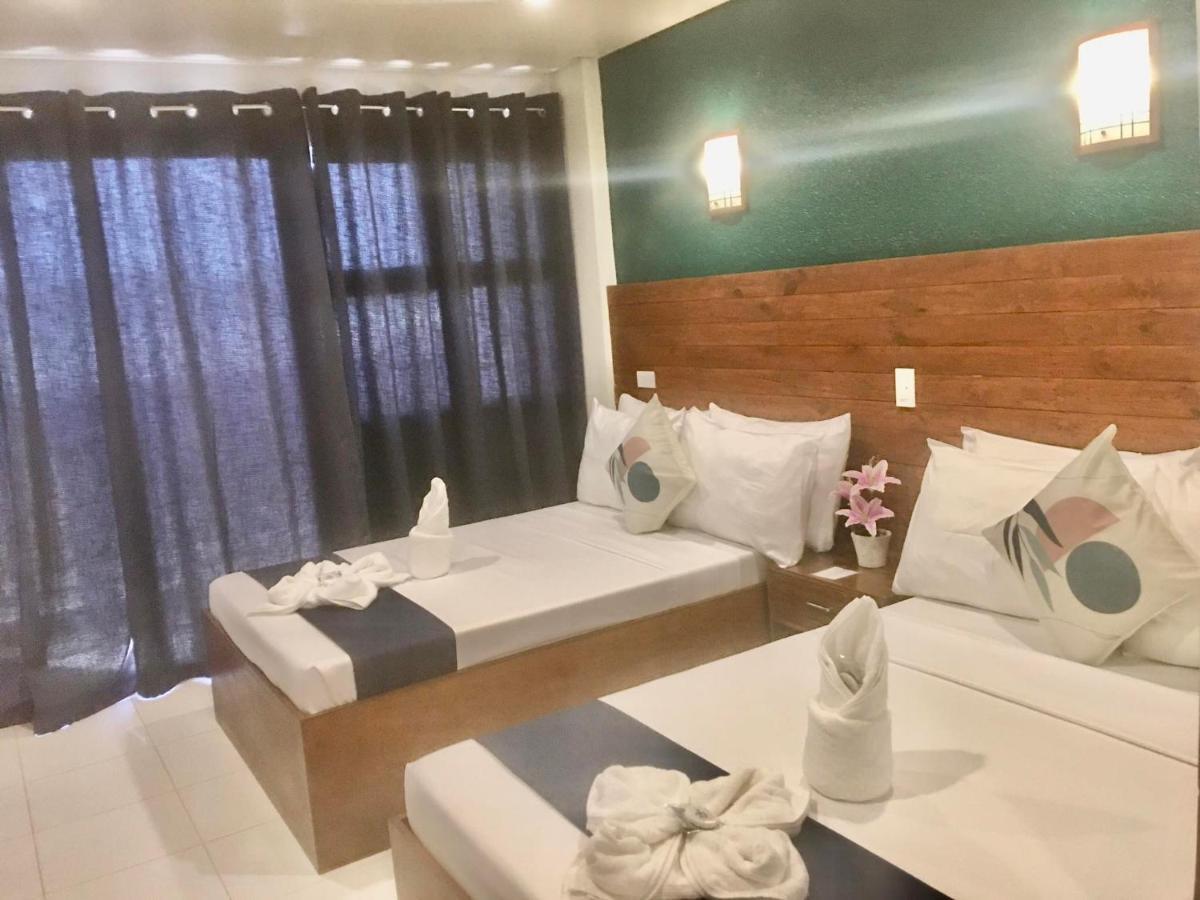 A&A Abe Bayfront Inn โกรอน ภายนอก รูปภาพ